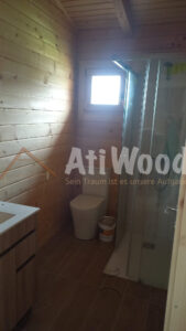Baño de Casa Marisol con acabados de madera